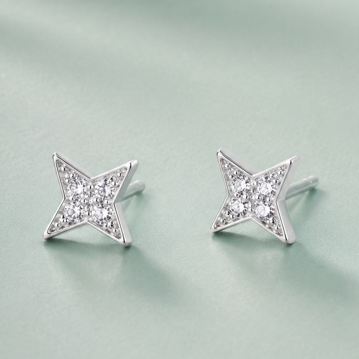 Estrella cuatro puntas plata circones 4 mm