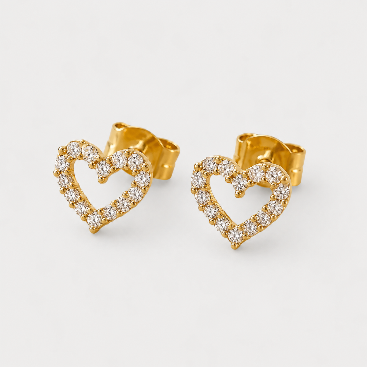 Aros Silueta corazón Oro 18k