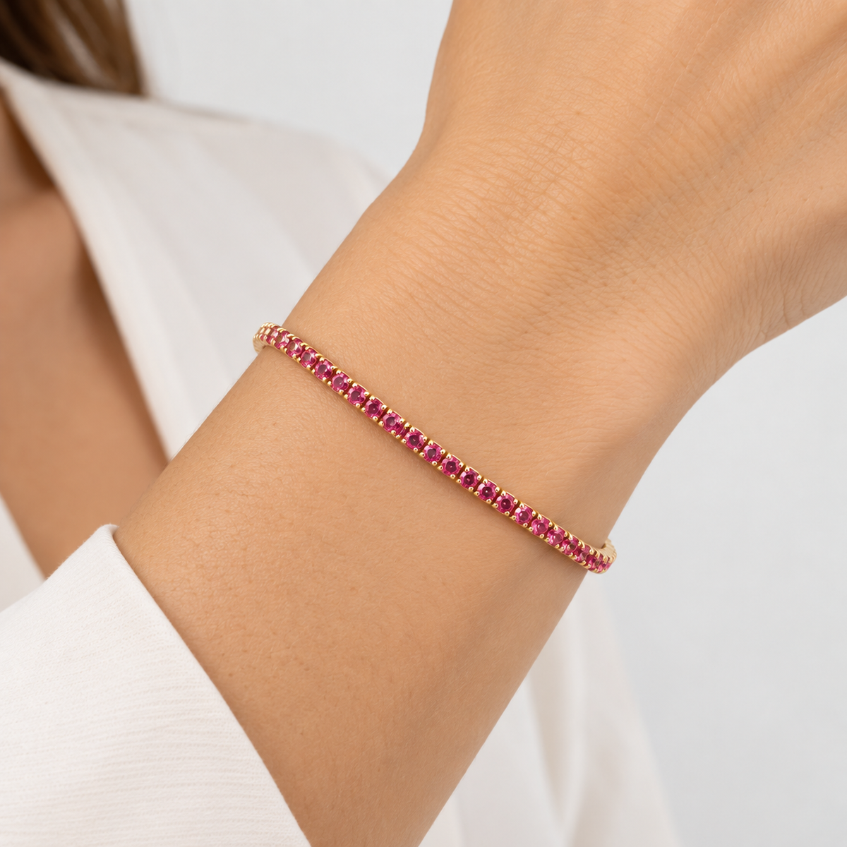 Pulsera Tenis Fucsia Elasticada Oro