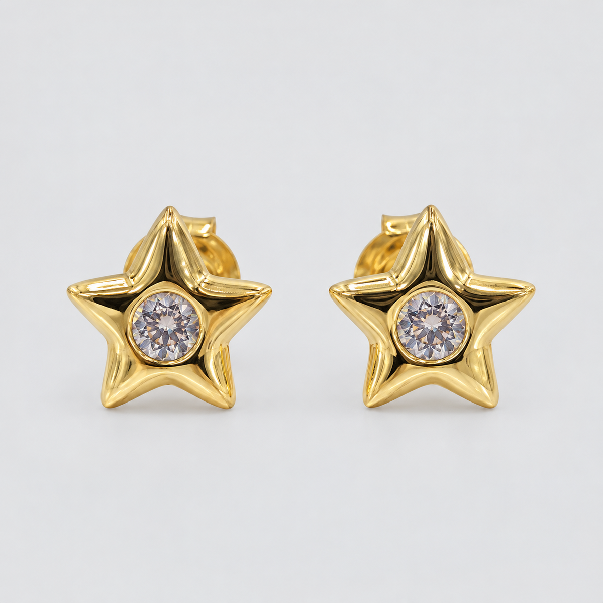Aros estrella con circón oro