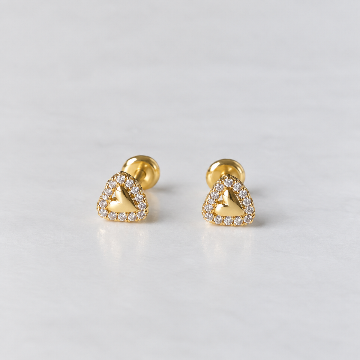 Aros mini corazón bebé tope oro