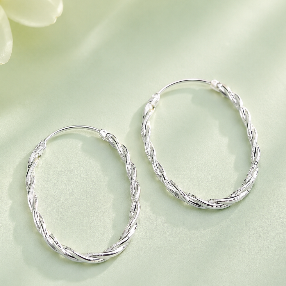 Aros argolla ovalada diamantada plata