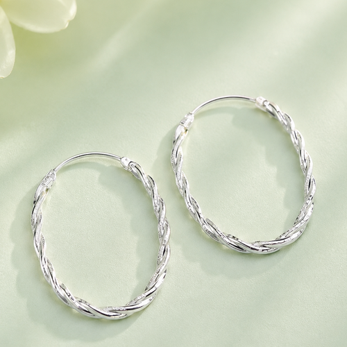 Aros argolla ovalada diamantada plata