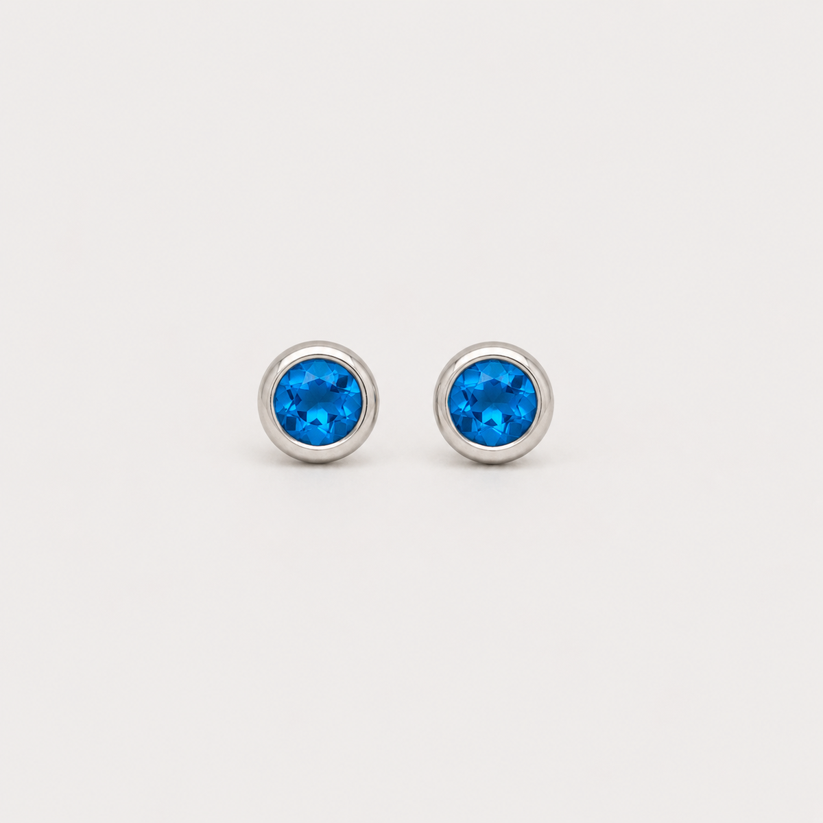 Aros redondos tope circón azul 6mm plata