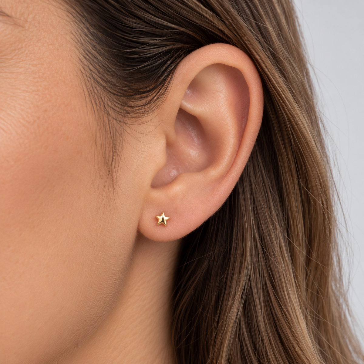Aros mini estrella oro