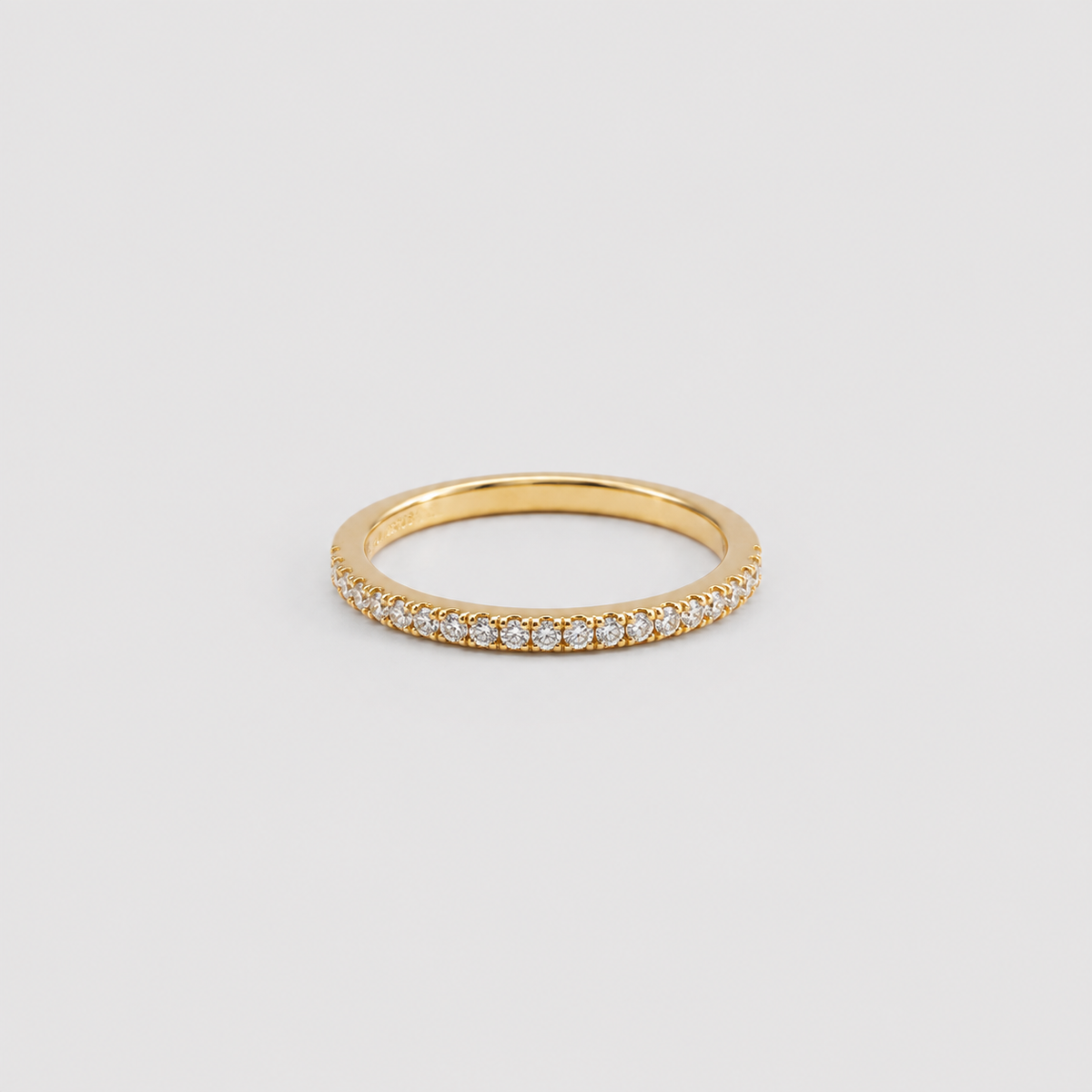 Anillo Buna medio cintillo Baño de Oro 18k