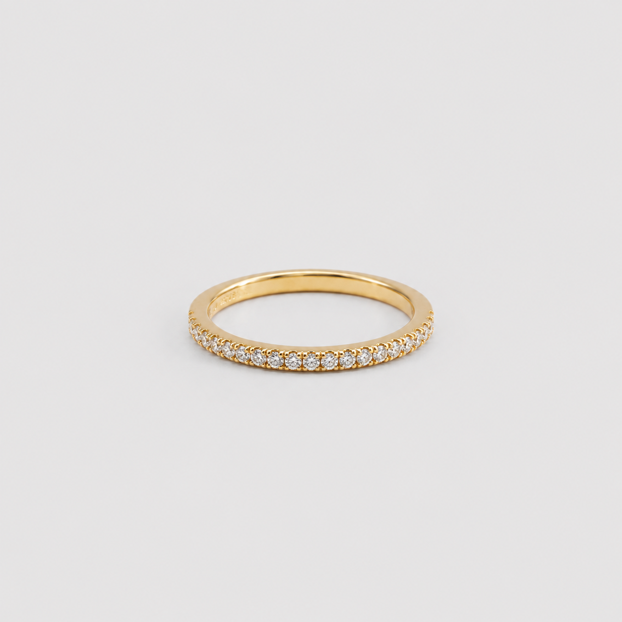 Anillo Buna medio cintillo Baño de Oro 18k