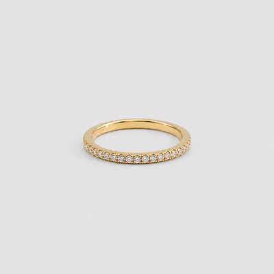 Anillo  medio cintillo Oro